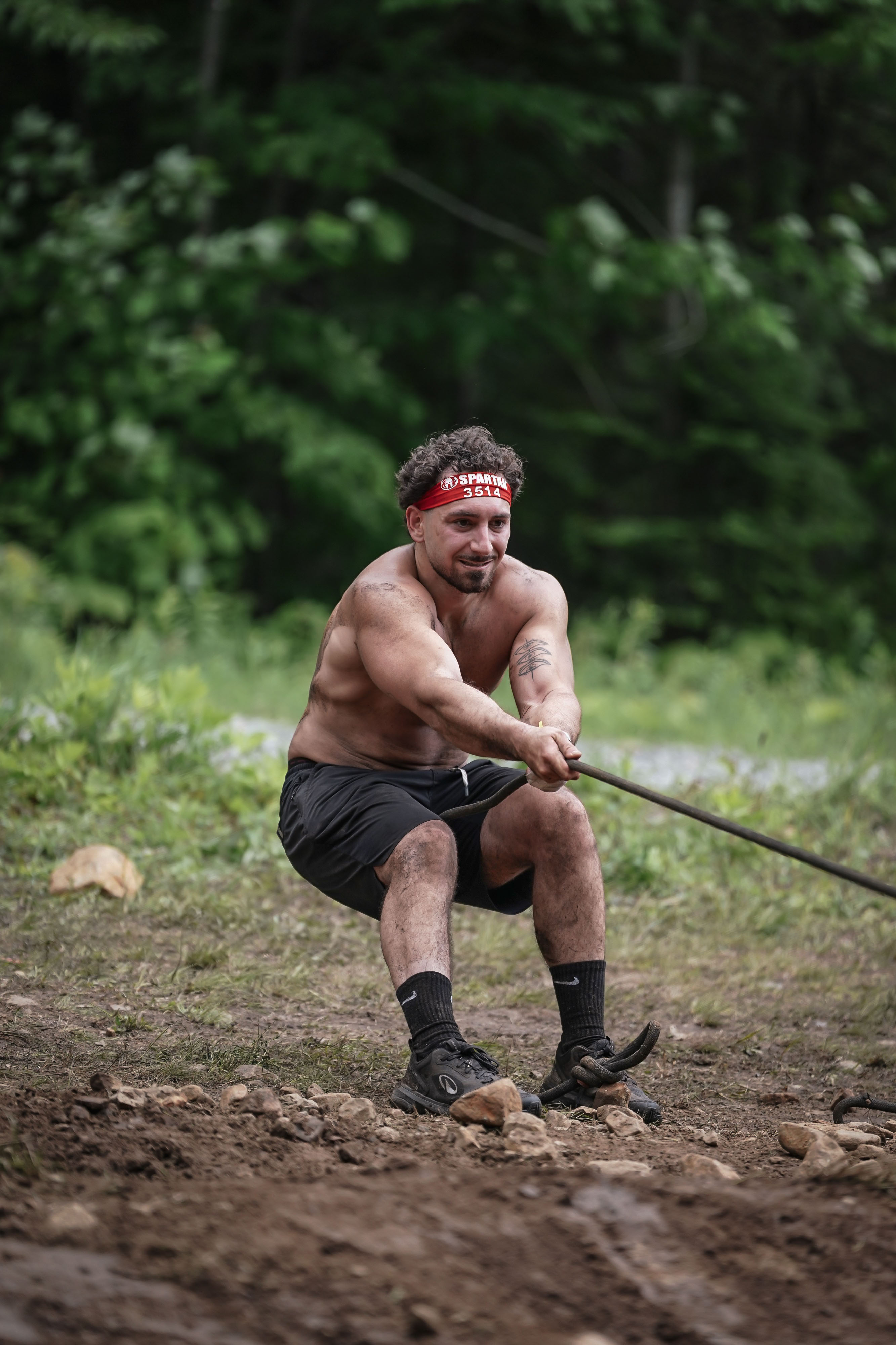 Hani Baydoun pulling a rope during an obstacle race